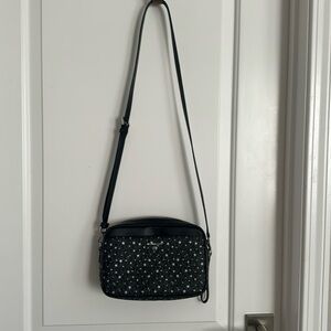 Brand new black with silver stars Michael Kors cross body purse! Never been used